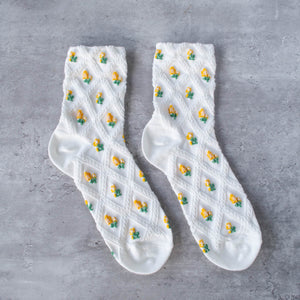Romantiske strømper med gule blomster