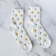 Romantiske strømper med gule blomster